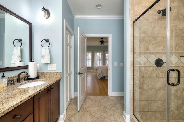 bathroom with vanity, ensuite bath, a stall shower, crown molding, and tile patterned floors