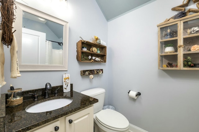 full bathroom with vanity and toilet