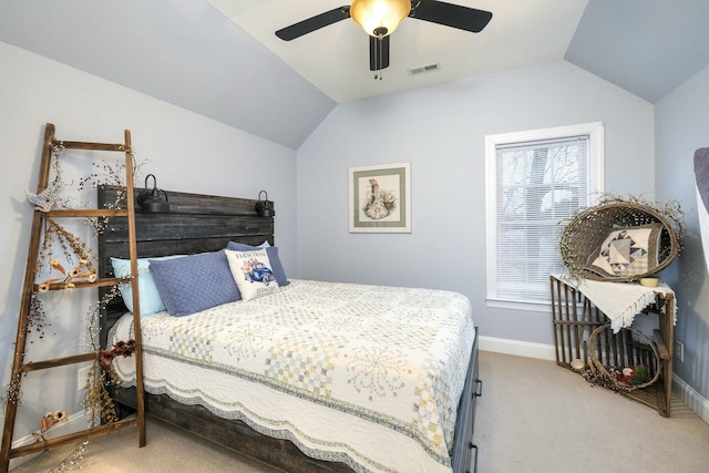 carpeted bedroom with visible vents, baseboards, a ceiling fan, and vaulted ceiling