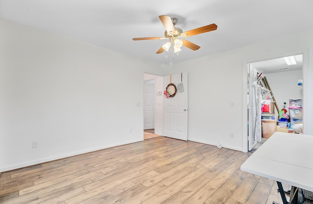 276 S Railroad Ave, Harleyville, SC 29448 - interior space featuring light wood finished floors, baseboards, and a ceiling fan