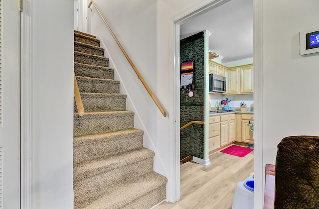 276 S Railroad Ave, Harleyville, SC 29448 - staircase featuring ornamental molding and wood finished floors