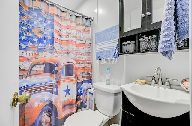 276 S Railroad Ave, Harleyville, SC 29448 - bathroom with toilet, vanity, and a shower with shower curtain