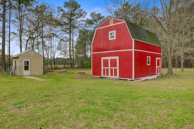 276 S Railroad Ave, Harleyville, SC 29448 - view of barn with a yard