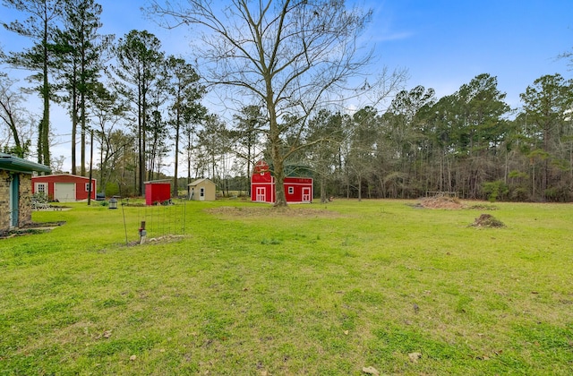276 S Railroad Ave, Harleyville, SC 29448 - view of yard with a storage shed and an outdoor structure