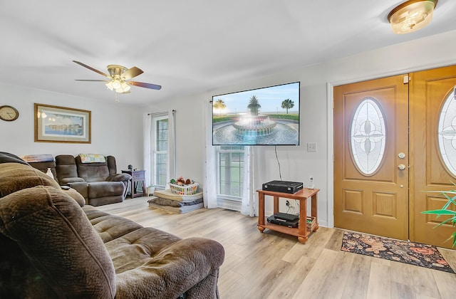 276 S Railroad Ave, Harleyville, SC 29448 - entrance foyer with light wood finished floors, a ceiling fan, and plenty of natural light