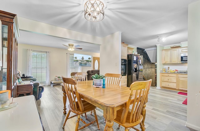 276 S Railroad Ave, Harleyville, SC 29448 - dining area with light wood-type flooring and a ceiling fan
