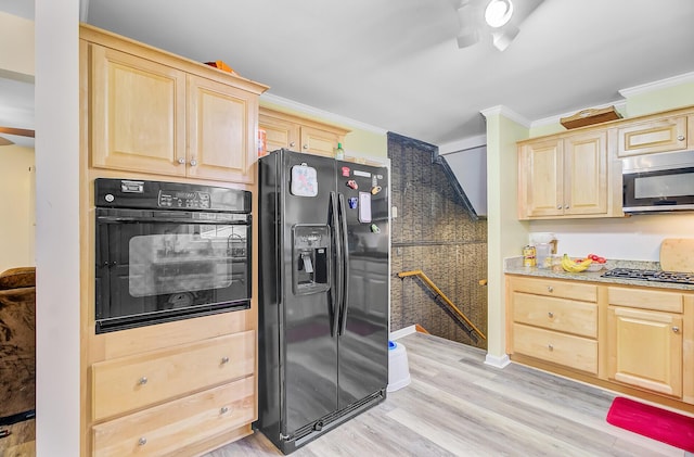276 S Railroad Ave, Harleyville, SC 29448 - kitchen with light brown cabinets, ornamental molding, and black appliances