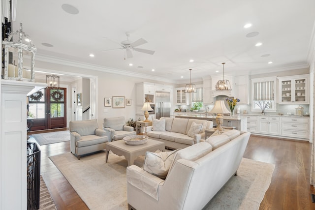 371 Bridgetown Pass, Mount Pleasant, SC 29464 - living area featuring ceiling fan, wood finished floors, ornamental molding, recessed lighting, and a chandelier