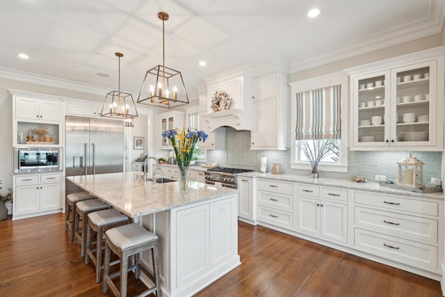 371 Bridgetown Pass, Mount Pleasant, SC 29464 - kitchen featuring built in appliances, white cabinets, glass insert cabinets, decorative backsplash, and crown molding