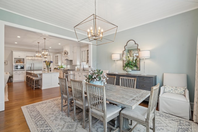 371 Bridgetown Pass, Mount Pleasant, SC 29464 - dining area with a chandelier, wood finished floors, ornamental molding, and recessed lighting