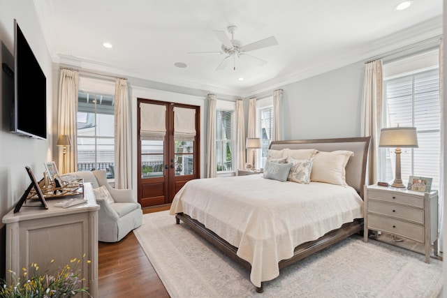 371 Bridgetown Pass, Mount Pleasant, SC 29464 - bedroom with multiple windows, crown molding, french doors, wood finished floors, and a ceiling fan