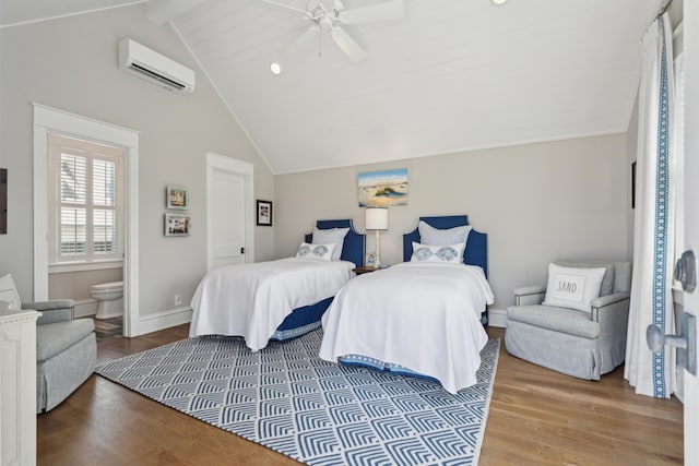 371 Bridgetown Pass, Mount Pleasant, SC 29464 - bedroom with a wall mounted air conditioner, wood finished floors, beamed ceiling, connected bathroom, and high vaulted ceiling