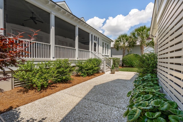 371 Bridgetown Pass, Mount Pleasant, SC 29464 - view of yard featuring a sunroom, ceiling fan, and a patio area