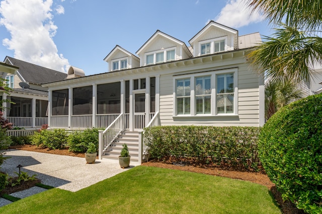371 Bridgetown Pass, Mount Pleasant, SC 29464 - view of front of house featuring a sunroom and a front lawn