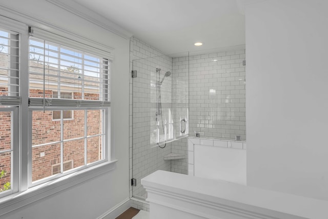 full bathroom featuring recessed lighting, a shower stall, and baseboards