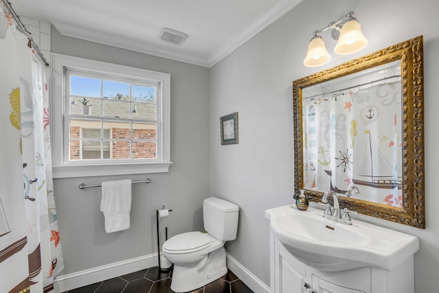 bathroom featuring toilet, vanity, baseboards, tile patterned floors, and crown molding