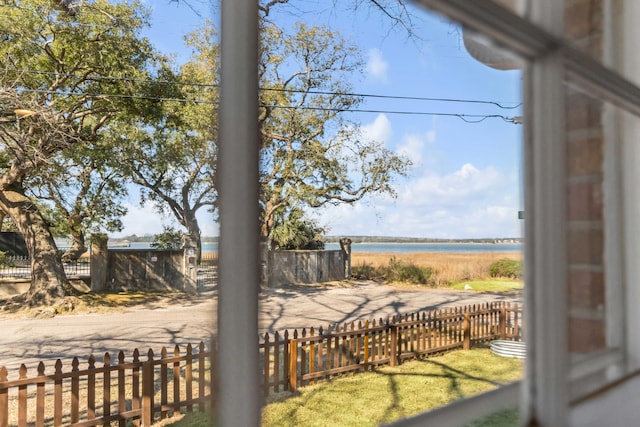 exterior space with a fenced front yard