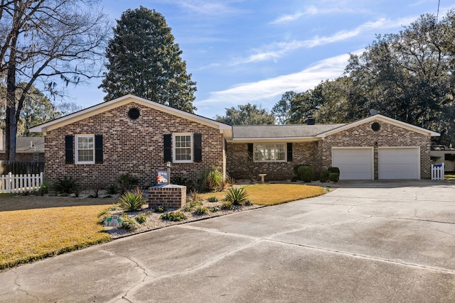 single story home with a garage