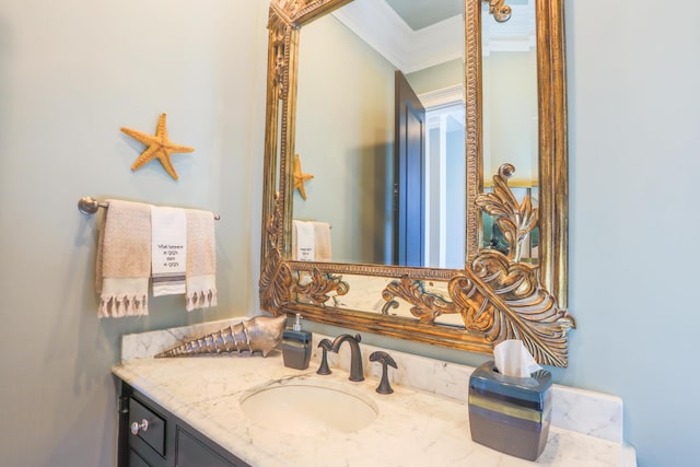 25 Ocean Point Dr, Isle Of Palms, SC 29451 - bathroom featuring vanity and crown molding