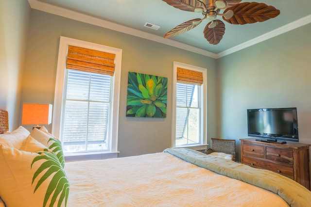25 Ocean Point Dr, Isle Of Palms, SC 29451 - bedroom featuring ornamental molding and ceiling fan