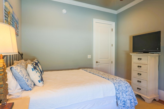 25 Ocean Point Dr, Isle Of Palms, SC 29451 - carpeted bedroom with crown molding and baseboards