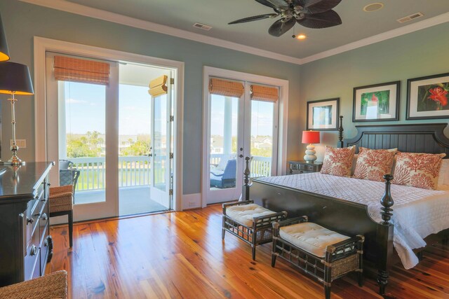 25 Ocean Point Dr, Isle Of Palms, SC 29451 - bedroom with access to outside, ornamental molding, wood finished floors, and french doors