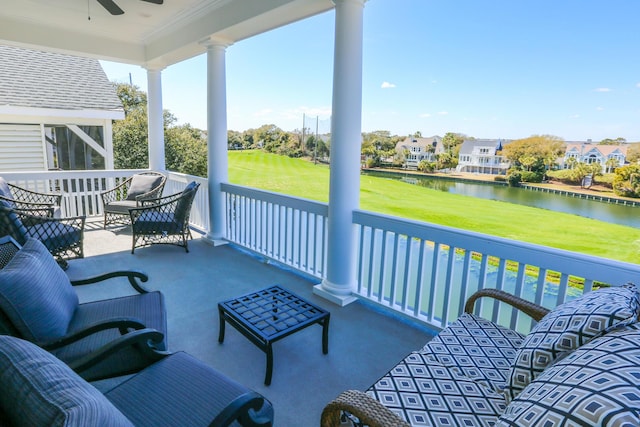 25 Ocean Point Dr, Isle Of Palms, SC 29451 - view of patio / terrace with a ceiling fan, a water view, outdoor lounge area, and golf course view