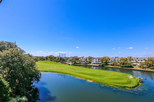 25 Ocean Point Dr, Isle Of Palms, SC 29451 - water view with a local golf course and nearby suburban area