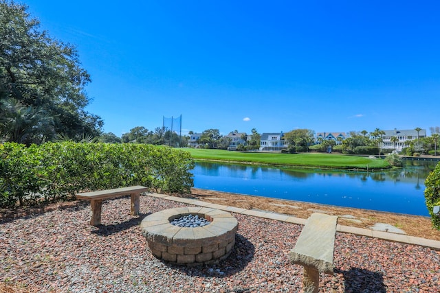 25 Ocean Point Dr, Isle Of Palms, SC 29451 - view of home's community with a fire pit, a water view, and a residential view