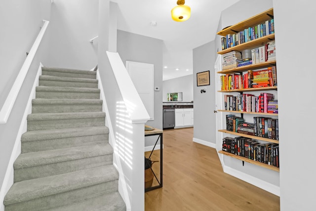 stairway with wood-type flooring