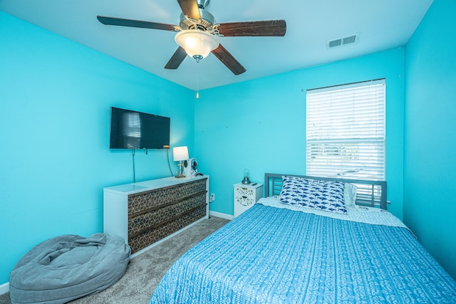 carpeted bedroom with ceiling fan