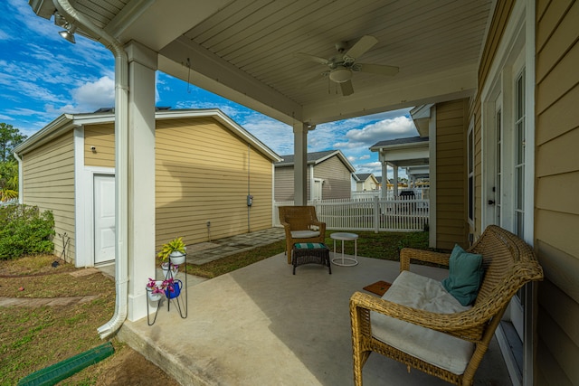 view of patio featuring ceiling fan