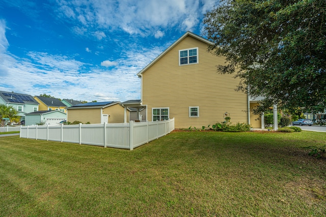 view of property exterior featuring a yard