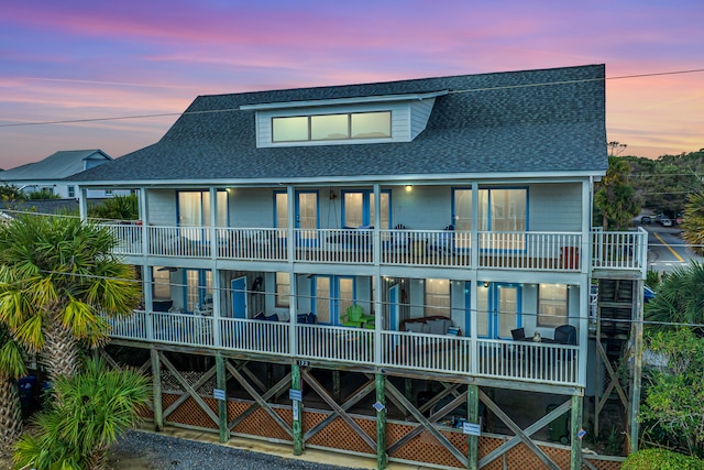 view of front of home with a balcony