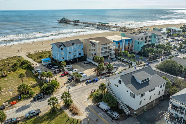 aerial view featuring a water view and a view of the beach