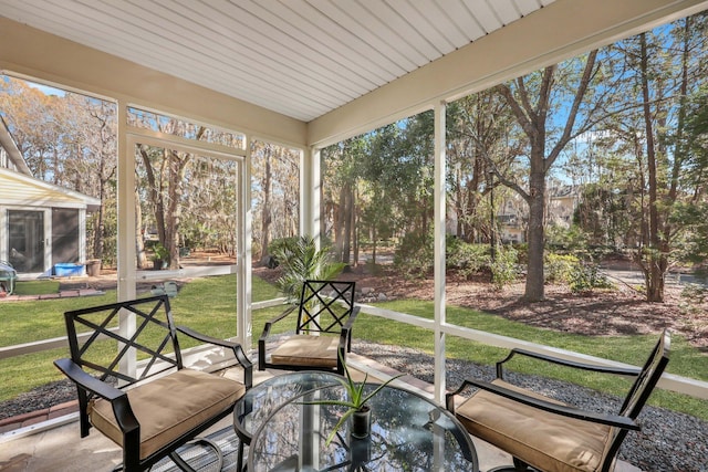 sunroom with plenty of natural light