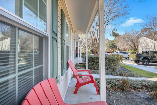 balcony featuring covered porch