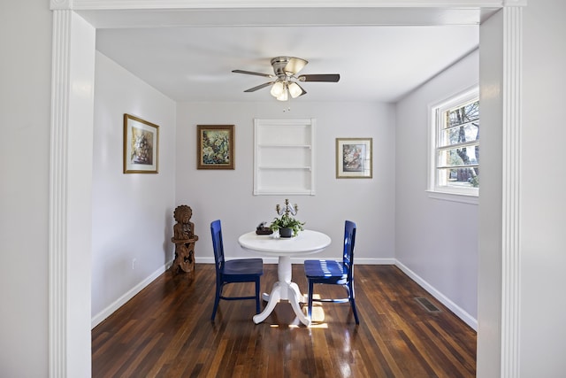 127 Ridge Rd, Summerville, SC 29485 - dining room featuring built in features, ceiling fan, and dark hardwood / wood-style flooring