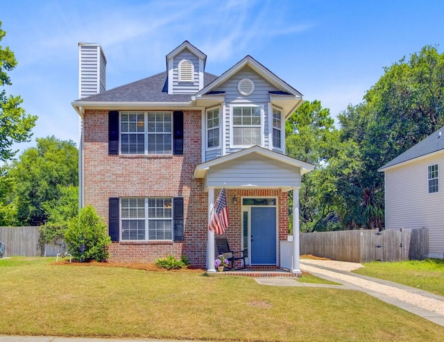 2404 Fulford Ct, Mount Pleasant, SC 29466 - view of front facade featuring brick siding, a chimney, and roof with shingles
