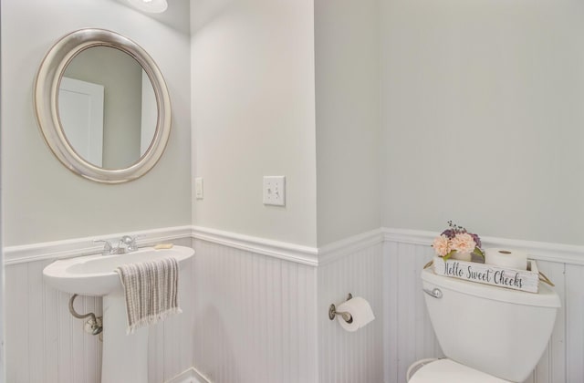 2404 Fulford Ct, Mount Pleasant, SC 29466 - bathroom with a wainscoted wall and toilet