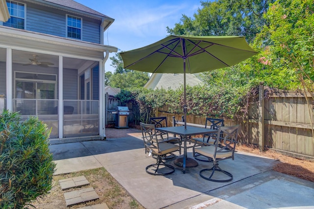 2404 Fulford Ct, Mount Pleasant, SC 29466 - fenced backyard with a patio area, outdoor dining area, a ceiling fan, and area for grilling