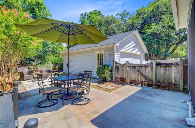 2404 Fulford Ct, Mount Pleasant, SC 29466 - view of patio with outdoor dining space and an outdoor structure