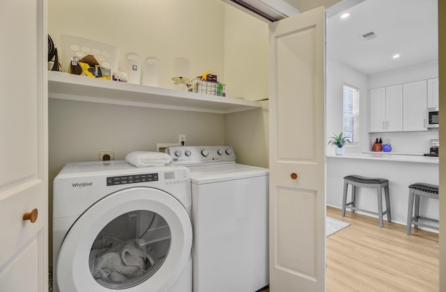 2404 Fulford Ct, Mount Pleasant, SC 29466 - washroom featuring washer and dryer, light wood-type flooring, and recessed lighting
