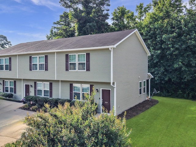 1069 Lexi Ct, Ladson, SC 29456 - view of front of house featuring a front lawn and roof with shingles