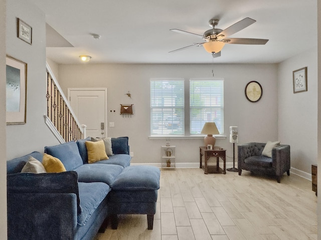 1069 Lexi Ct, Ladson, SC 29456 - living room with a ceiling fan, stairway, light wood finished floors, and baseboards