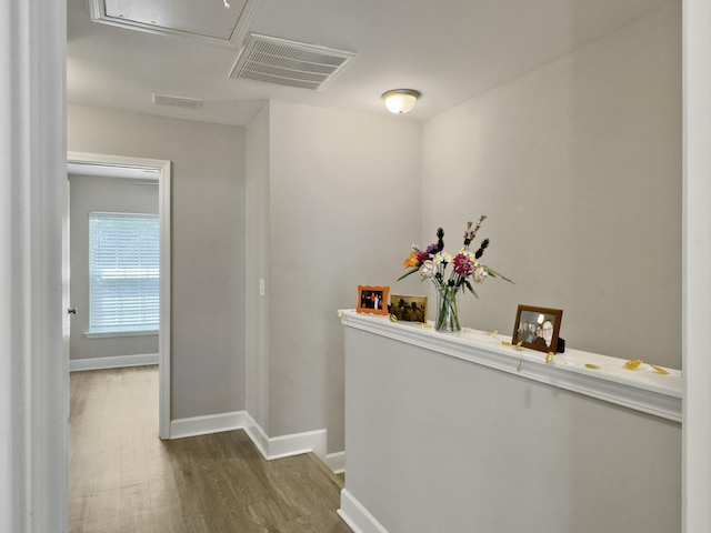 1069 Lexi Ct, Ladson, SC 29456 - hall featuring wood finished floors, baseboards, and attic access