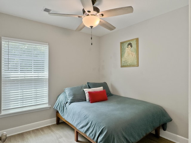 1069 Lexi Ct, Ladson, SC 29456 - bedroom featuring baseboards, wood finished floors, and ceiling fan