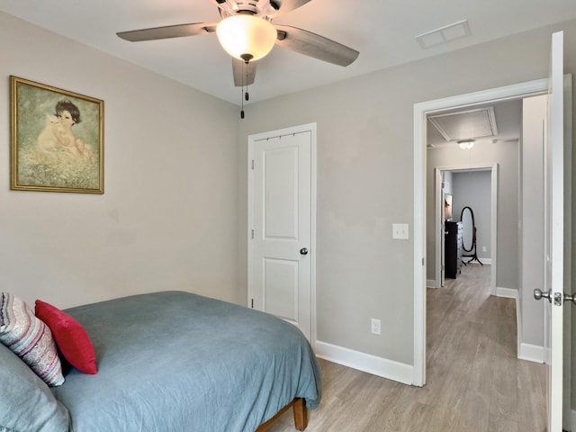 1069 Lexi Ct, Ladson, SC 29456 - bedroom with attic access, light wood-style flooring, and baseboards