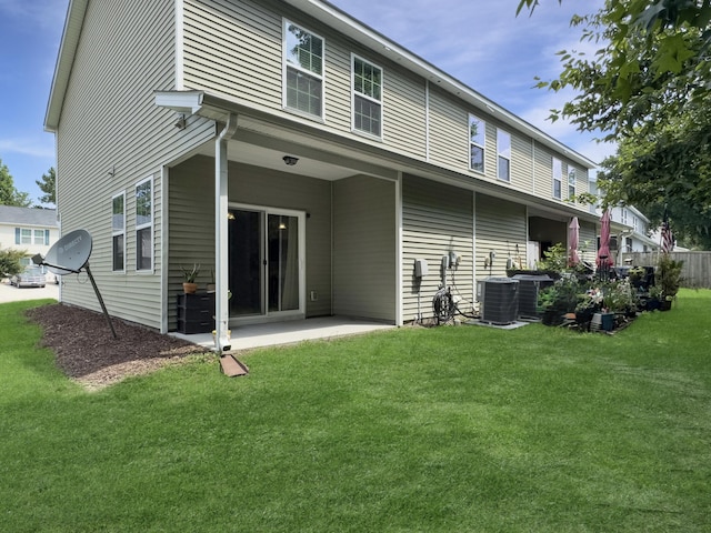 1069 Lexi Ct, Ladson, SC 29456 - rear view of property with a yard, a patio, and central AC