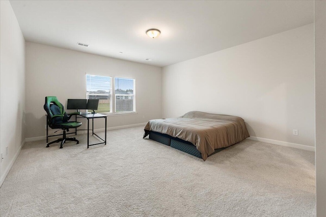 bedroom featuring carpet